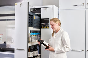 Chemicals are stored in a single cabinet in compliance ...