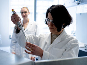 Unexpected energy storage capability where water meets metal surfaces