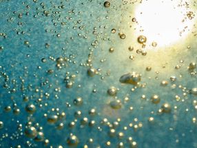 Capturing greenhouse gases with the help of light