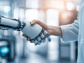 Not humans or robots, but humans and robots