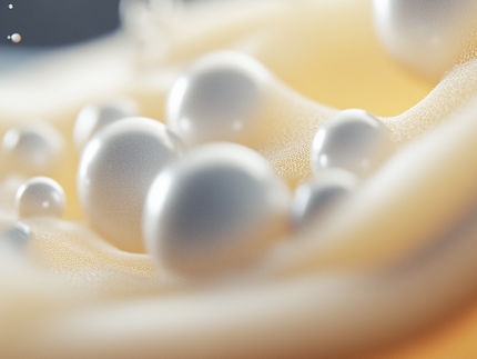 Rolling particles make suspensions more fluid